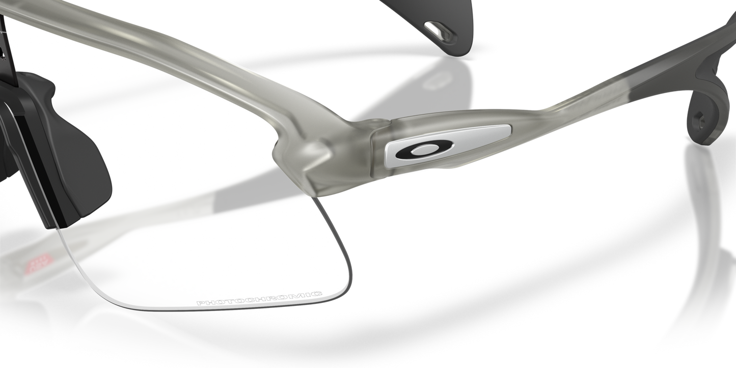 Okaley Sunglass Stunt Devil clear to black iridium photochromic Lenses with grey ink Frame