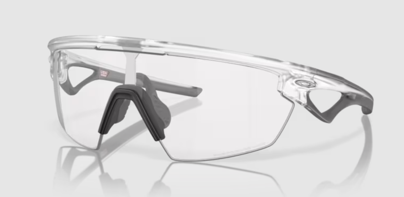 Oakley Sphaera Sunglass with Matte clear Frame and photochromic lenses TheTriWorld