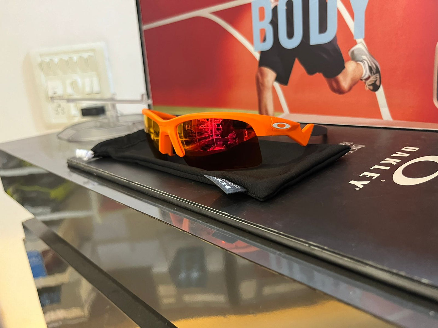 Oakley Capacitor Matte Neon Orange Frame with Prizm Ruby Lens