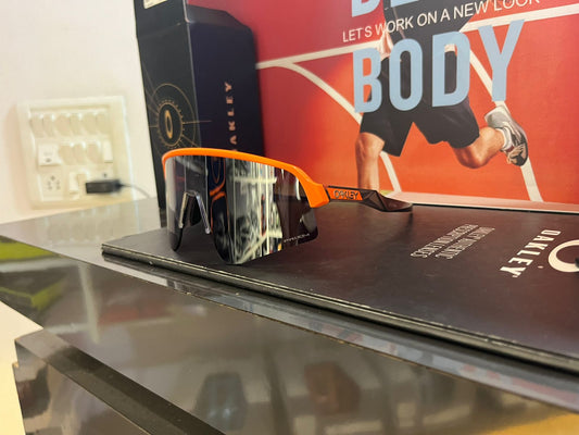 Oakley Sutro Lite Sweep with Matte Neon Orange Frame and Prizm Road Black Lens