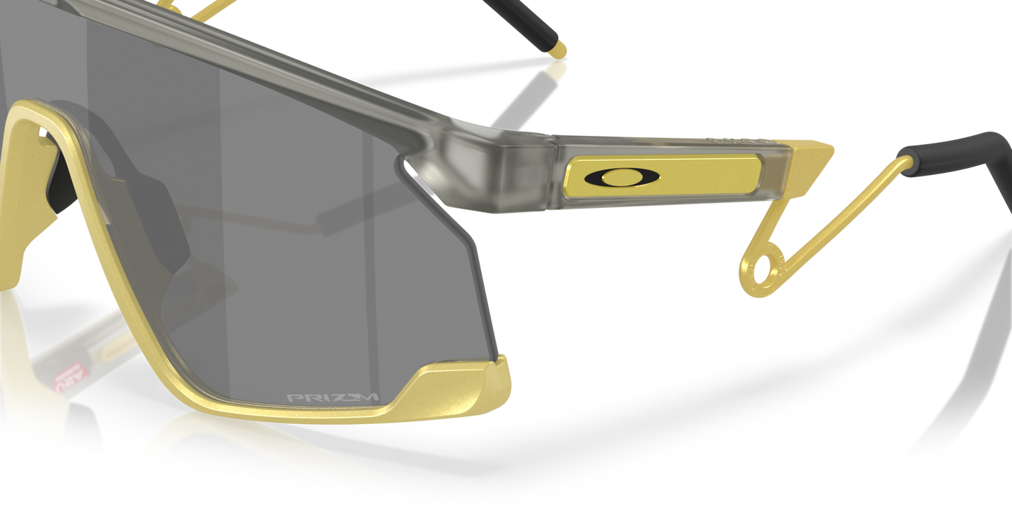 Oakley Sunglass BXTR Metal Alloy Collection prizm black Lenses With matte grey ink/vintage gold Frame
