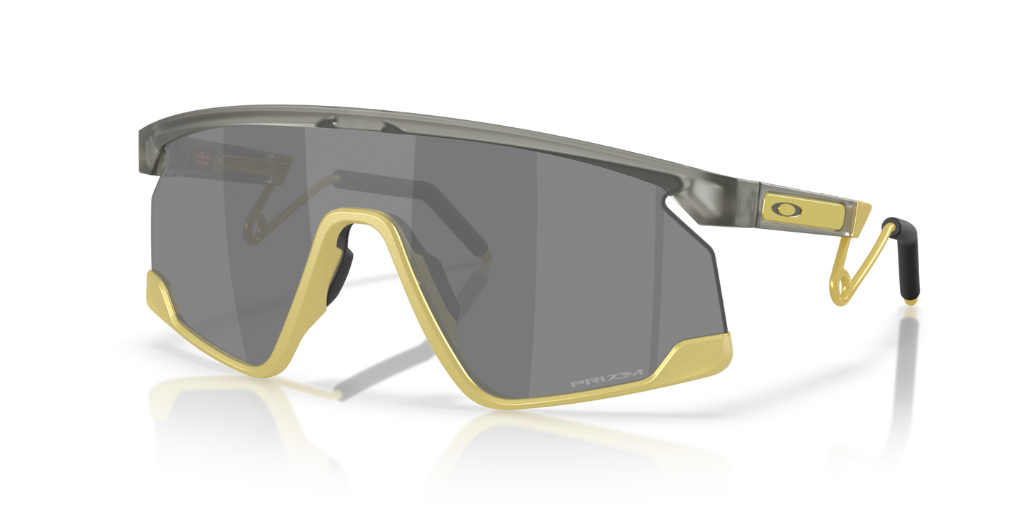 Oakley Sunglass BXTR Metal Alloy Collection prizm black Lenses With matte grey ink/vintage gold Frame