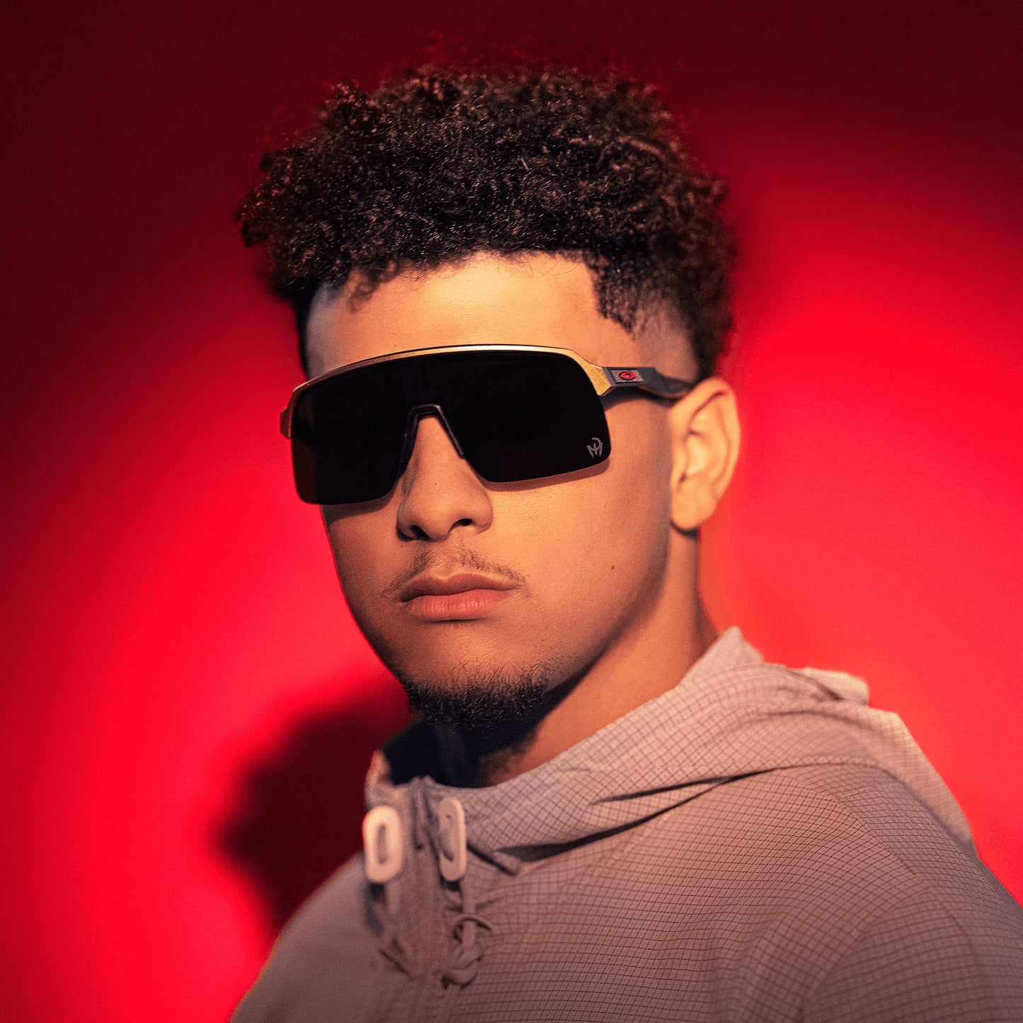 oakley Sunglass Sutro Lite Patrick Mahomes II Collection prizm black Lenses,  olympic gold Frame