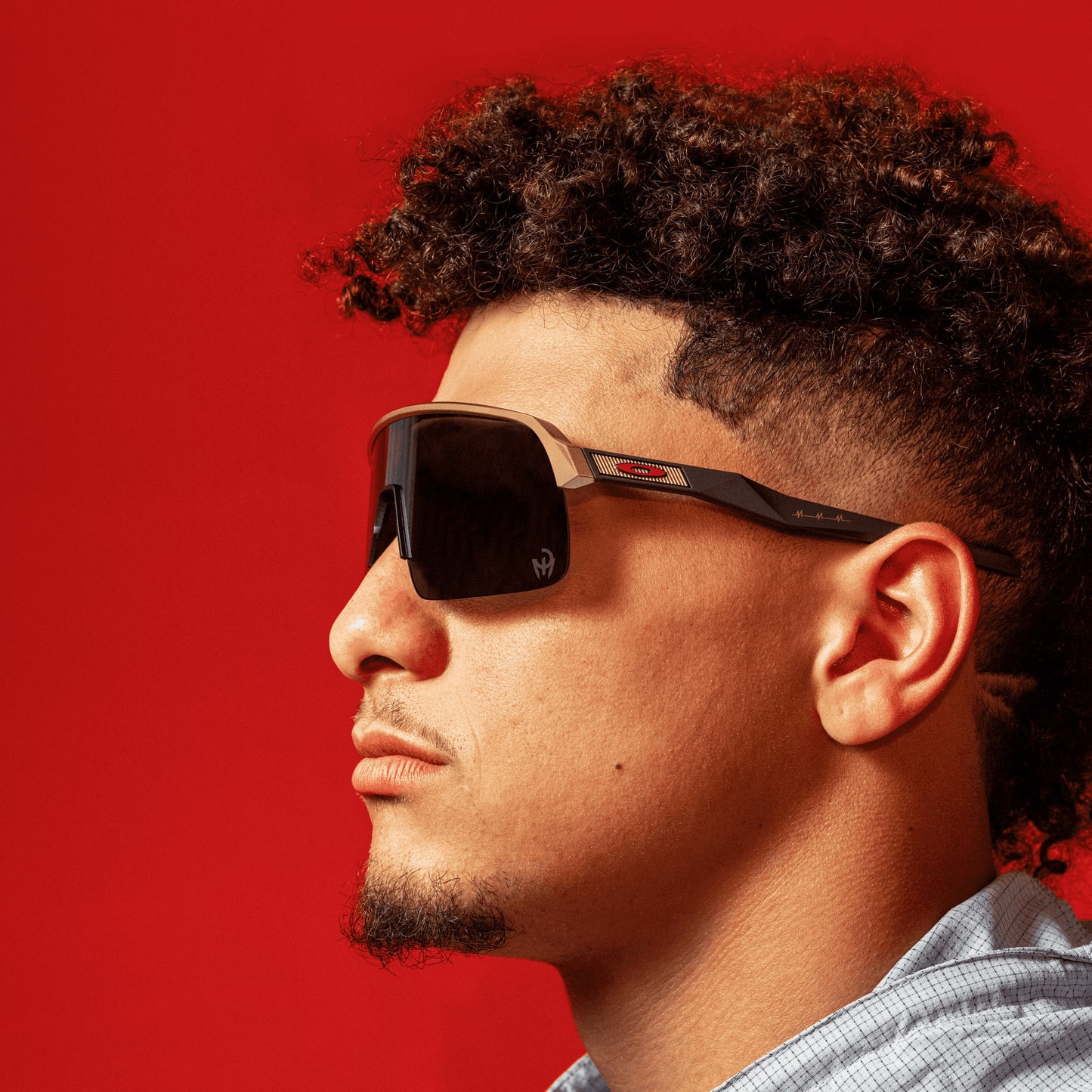 oakley Sunglass Sutro Lite Patrick Mahomes II Collection prizm black Lenses,  olympic gold Frame