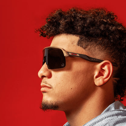 oakley Sunglass Sutro Lite Patrick Mahomes II Collection prizm black Lenses,  olympic gold Frame