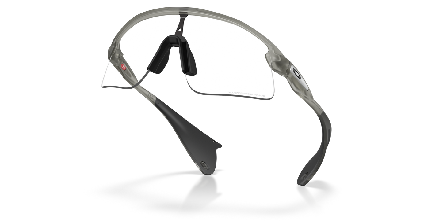 Okaley Sunglass Stunt Devil clear to black iridium photochromic Lenses with grey ink Frame