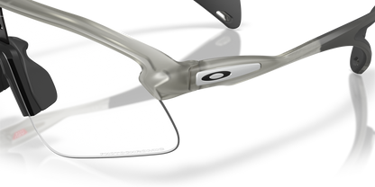 Okaley Sunglass Stunt Devil clear to black iridium photochromic Lenses with grey ink Frame