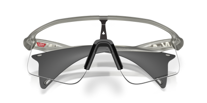 Okaley Sunglass Stunt Devil clear to black iridium photochromic Lenses with grey ink Frame