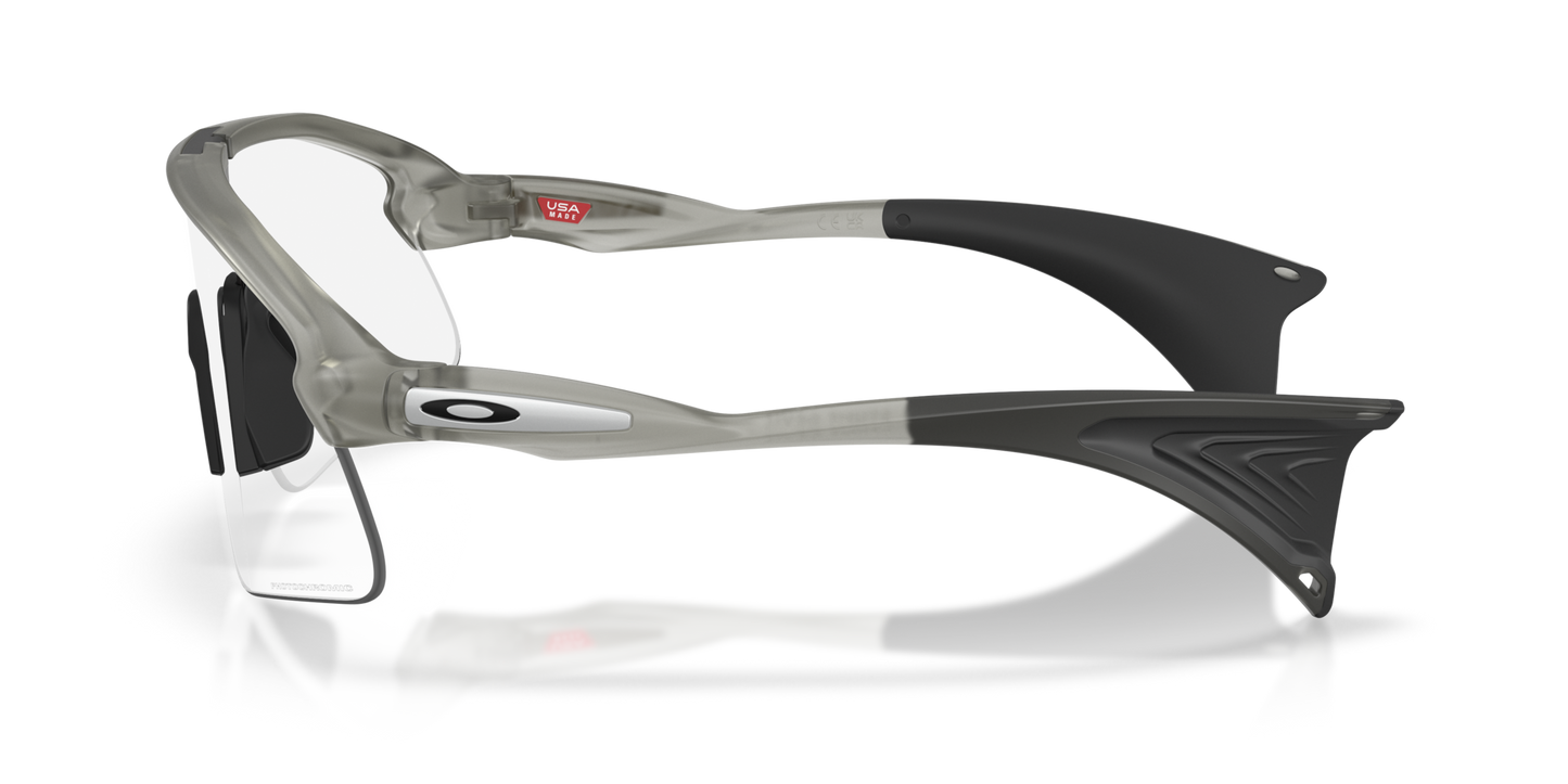 Okaley Sunglass Stunt Devil clear to black iridium photochromic Lenses with grey ink Frame