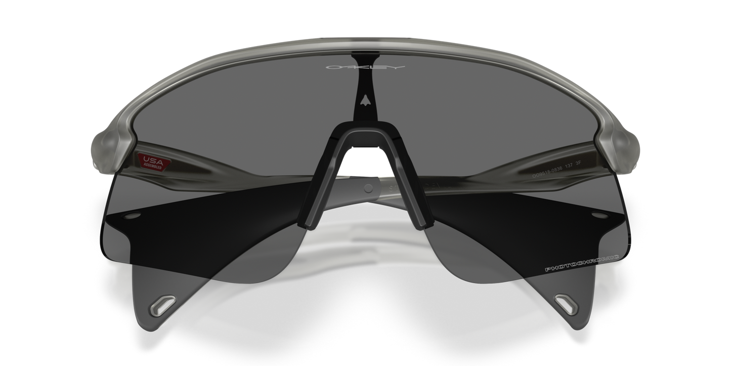 Oakley Sunglass Stunt Devil S clear to black iridium photochromic Lenses with  matte grey ink Frame