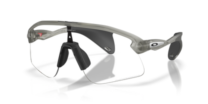 Oakley Sunglass Stunt Devil S clear to black iridium photochromic Lenses with  matte grey ink Frame